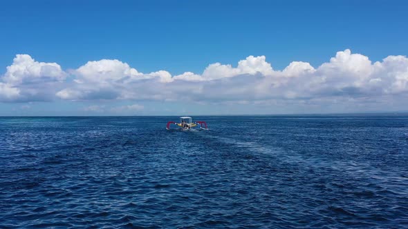 Boat and Waves. View from Drone at The Ocean Surface. Indonesia