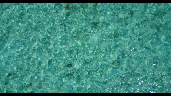 Aerial drone travel of perfect tourist beach voyage by blue sea with white sandy background of a pic