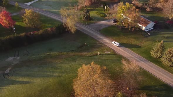 Beautiful aerial view of Michigan country road, south east Michigan with greens on the side of the e