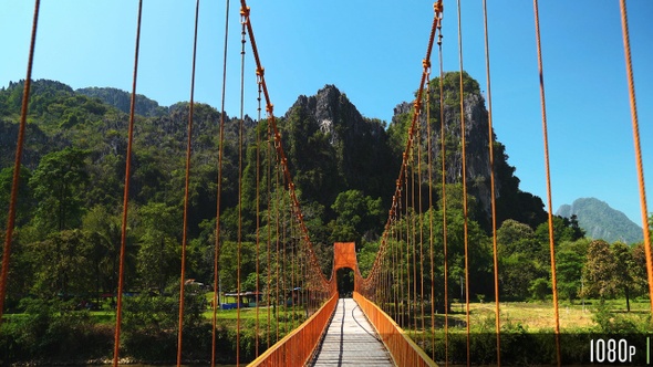 Empty Wood Suspension Bridge Walkway in the Mountains of Vang Vieng, Laos