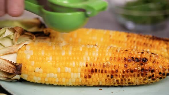 Time lapse. Step by step. Making Mexican corn on the cob Elote.