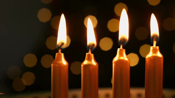 Candles burning at christmas time