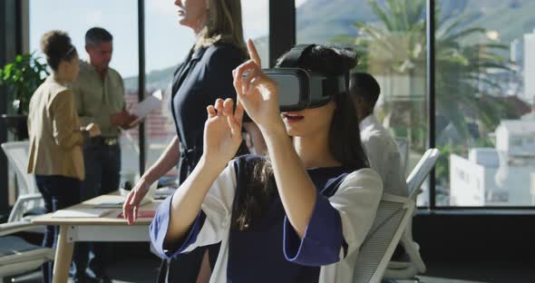 Young woman wearing VR headset