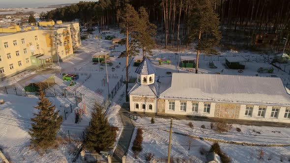 Aerial view of church and kindergarten in the village 02