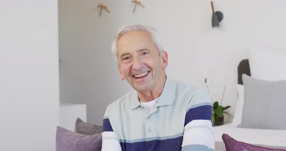 Animation of happy caucasian senior man looking at camera