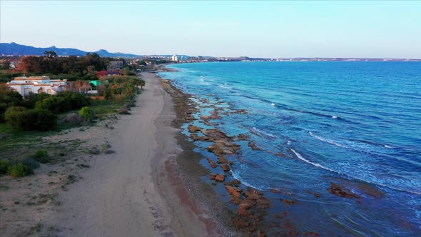 Aerial landscape of Cyprus coast and Mediterranean sea, forward