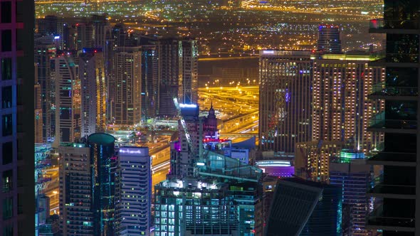 Night Cityscape of Dubai Marina . Pan Up