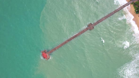 Amazing small bridge in to the summer sea High angle view Beautiful sea surface in sunny day