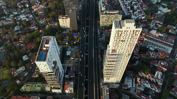 Highway Interstate Road between Two Skyscrapers, Segundo Piso Periférico in Mexico City, Aerial