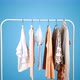 Clothes on a hanger on different colored backgrounds. - VideoHive Item for Sale