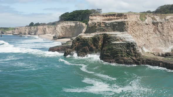  Aerial of a Beautiful High Sheer Cliffs at the Scenic Pacific Ocean Shore. 