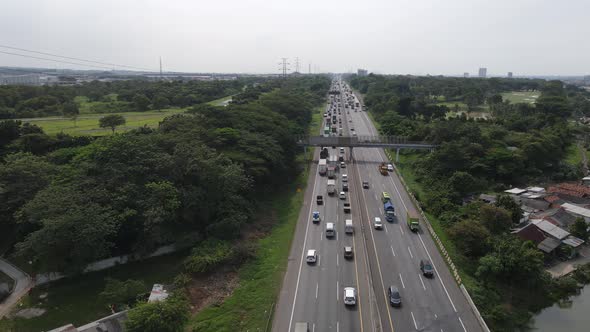 Aerial view of Indonesia Highway with busy traffic.