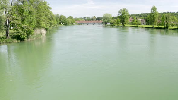 Flight with the drone via the Aare towards Wangen an der Aare Swiss town in the canton of Berne with