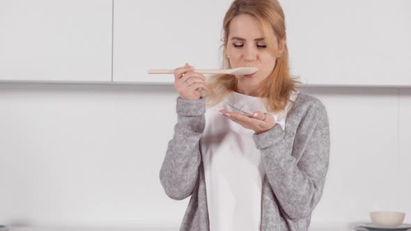 Cheerful Female in the Kitchen