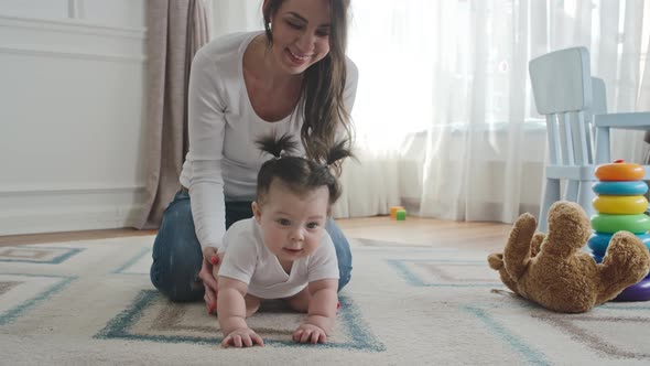 Lovely Mom and Little Daughter at Home alt