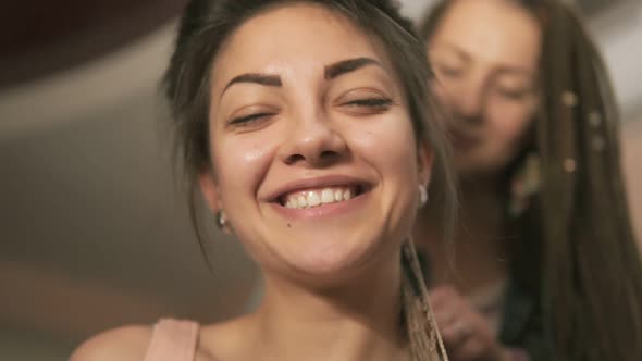 Closeup View of a Young Smiling Hipster Woman in the Hair Salon
