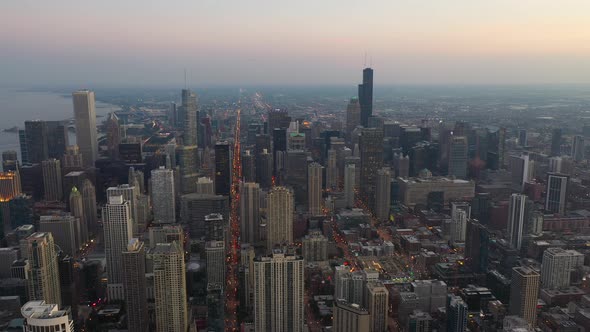 Flyover Downtown Chicago at Sunset