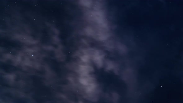Starry sky and clouds captured in time-lapse format