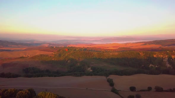 Aerial View of Tuscany Cultivated Hills at Sunrise Val D'orcia