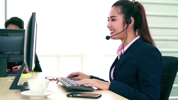 Business People Wearing Headset Working in Office