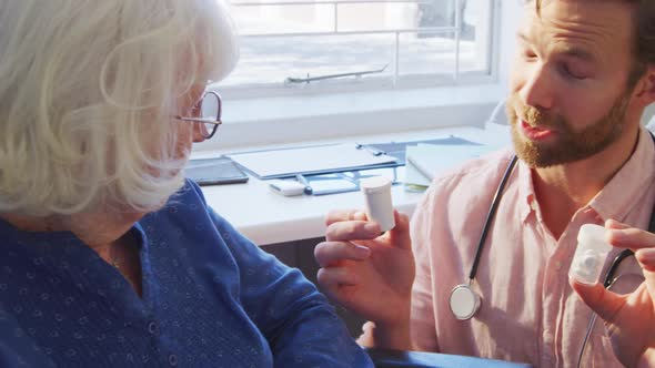 Doctor examining a senior woman in a retirement home