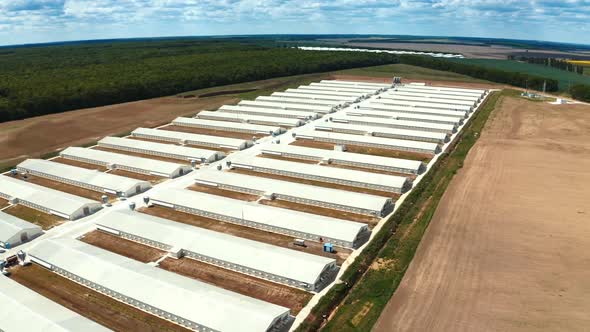 Modern manufacture complex on the field. Panoramic view of industrial plant.