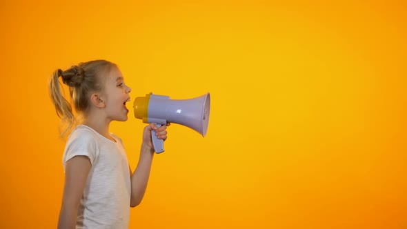 Preteen Girl Shouting in Loudspeaker