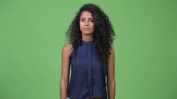 Young Happy Beautiful Hispanic Businesswoman with Curly Hair