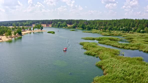 Aerial Video Filming Forest, Village, Beach River, Lake, Body Of Water, Nature, A Boat