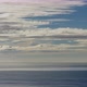 Clouds Moving Through A Beautiful Blue Sky Over The Ocean - VideoHive Item for Sale