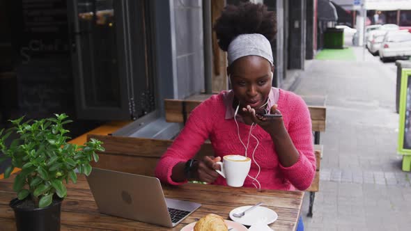 African american sitting in a cafe