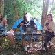 Young women cooking and use smartphone take photo on camping - VideoHive Item for Sale