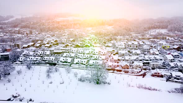 Village Homes Houses in Winter Snow Season at Sunet