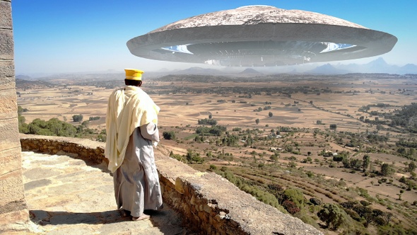 Afriacn Priest Lookin At Large Alien Ufo Saucer Ship Over The Mountains