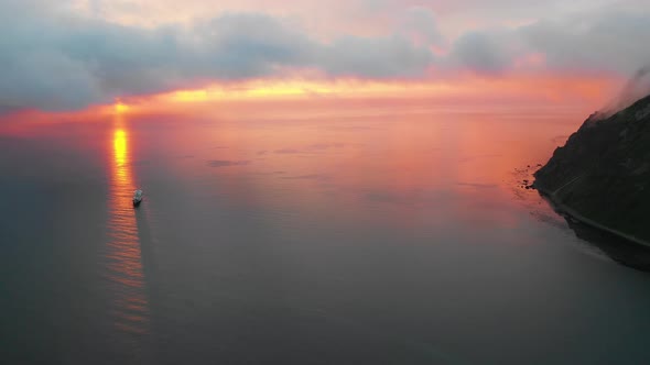 Aerial view of a boat sailing the bay, Unalaska, Alaska, United States.