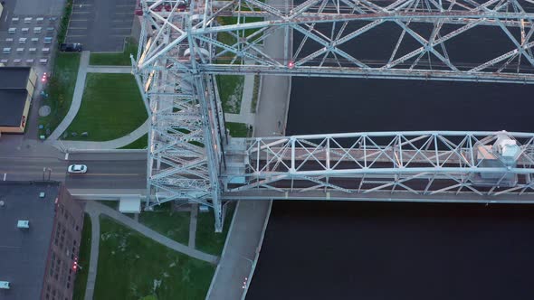 Aerial top down view road along lift bridge spanning lake superior canal in Duluth, Minnesota - dron