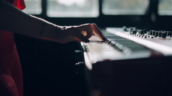 Hands Are Playing Digital Piano Synthesizer. Professional Pionist Woman Plays Solo of Music or