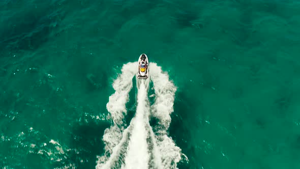 Tourists on a Jet Skis on a Tropical Resort