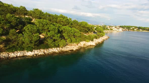 Aerial drone shot of the treeline in Selca Island Brac Croatia Europe