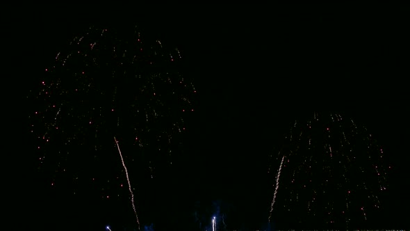 Colorful Firework display at night on sky background