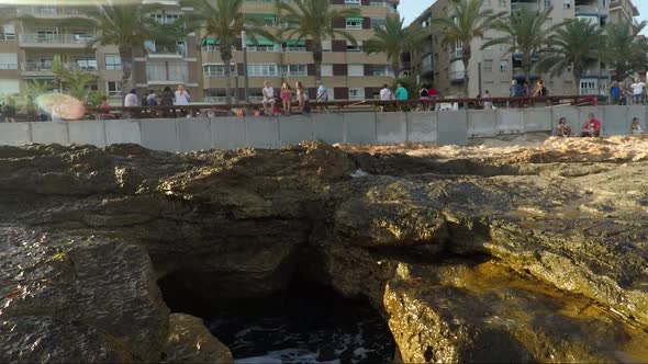 waves hits into the promenade shore