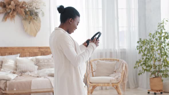 Afro American Woman African Black Ethnic Expectant Mother Listening to Music Song Melody Enjoying