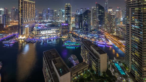 Night Illumination of Dubai Marina Aerial Timelapse UAE