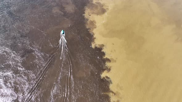 Famous Meeting of the Waters tourism landmark at Manaus Brazil.