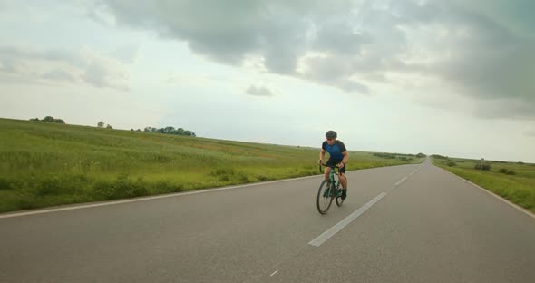 The Cyclist is Going Uphill