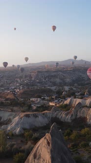 Vertical Video of Hot Air Balloons Flying in the Sky Over Cappadocia Turkey