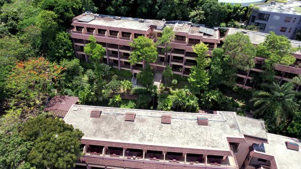 Drone View of the Hotel with Green Trees