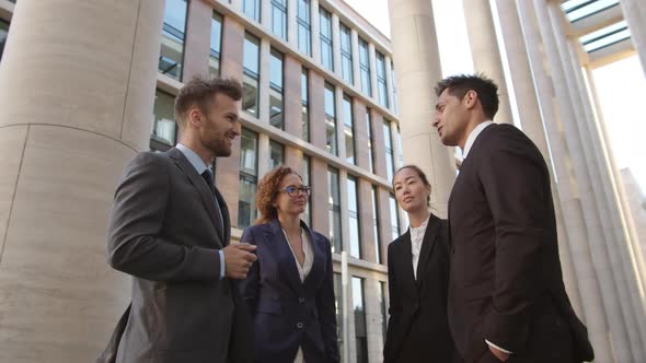 Group of Businesspeople Talking Outside