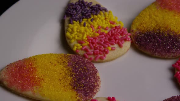 Cinematic, Rotating Shot of Easter Cookies on a Plate 