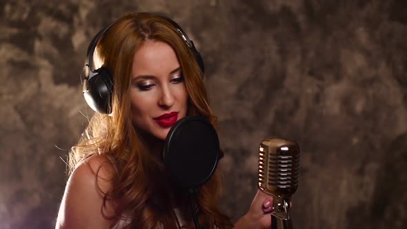 Woman Singer Recording a Song in Music Studio,slow Motion, Close Up